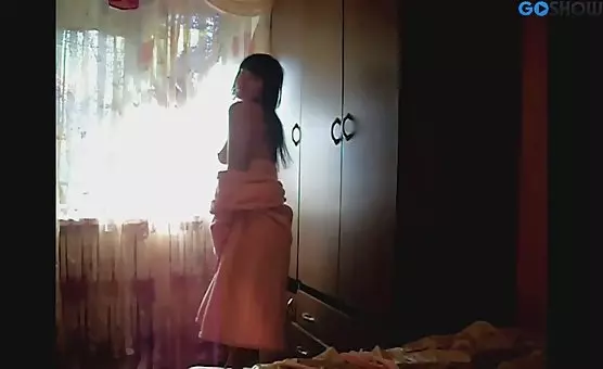 Brunette Unveils in Tempting Bathrobe
